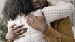 © Synthex - Caring black husband supports his upset wife as they work through problems in their marriage