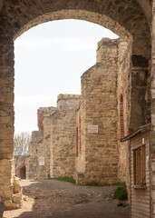 Canvas Print - Closing in the gate to the Tanczyn Castle (castle ruins, fragments of walls) in the village of Rudno, near Krakow in Poland.