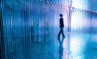 businesswoman walking in the beautiful bokeh light