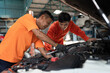 © chachamp - Asia mechanic man examining and maintenance to engine a vehicle car hood