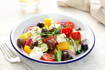 Poster - Greek salad. Vegetable salad with feta cheese, tomato, olives, cucumber, red onion and olive oil. Healthy vegetarian mediterranean diet food