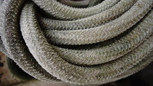 Dirty Coiled Rope Texture As Background