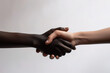 © ADDICTIVE STOCK - Generative AI image of unrecognizable black female shaking hands with caucasian anonymous person demonstrating solidarity for Black Lives Matter manifestation against white background