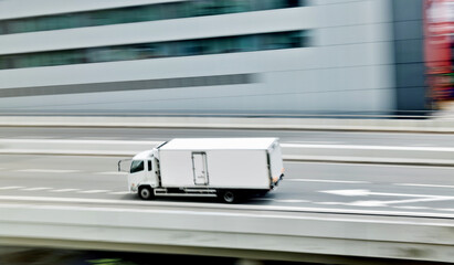 Poster - Container truck motion blur on highway overpass