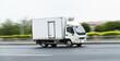 © xy - White truck driving on the highway