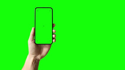 Wall Mural - a set with a phone in hand with a green screen and tracking markers, along with a hand tapping a dis