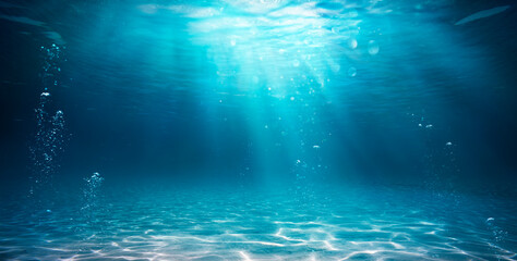 underwater ocean - blue abyss with sunlight - diving and scuba background