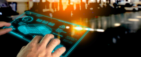 Mechanic man using EV electric vehicle analysis display screen in electric car factory, EV electric vehicle technology concept
