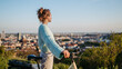 © Halfpoint - Young woman on electro bicycle, concept of commuting and ecologic traveling.