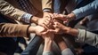 © Cremeblur - A group of individuals joining hands to showcase the concept of unity and teamwork, representing a business team standing together in solidarity