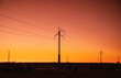 Power lines at dawn outside of Alice Springs, Northern Territory, Australia