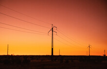 Power Lines At Dawn Outside Of Alice Springs, Northern Territory, Australia