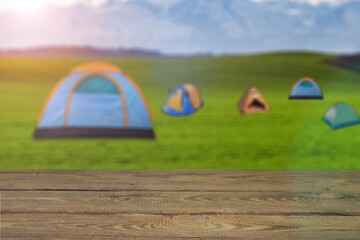 Canvas Print - Wooden blank table top on camping tent background