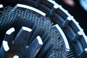 Complicated detail made by powder 3d printer in workshop