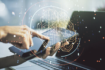 Wall Mural - double exposure of creative human brain microcircuit and hand working with a digital tablet on backg