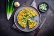 Traditional Italian vegetable frittata with zucchini, spring onion and cheese served as a top view on a Nordic design plate with copy space, generate ai