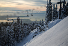 Chairlift And Snow Slope Overlooking Vancouver British Columbia Canada
