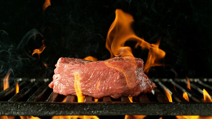 Wall Mural - Barbecue Grill WIth Raw Beef Steak.