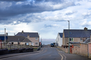 Street and houses. North sea in the back. City of Thurso. Northern Scotland. North coast. 