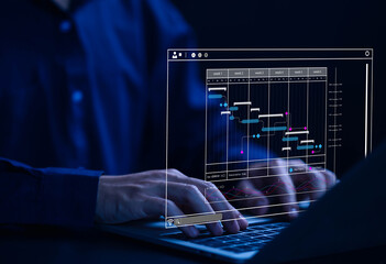 Fototapete - business manager managing business planning project schedules in the office. Gantt chart showing on virtual screen.	
