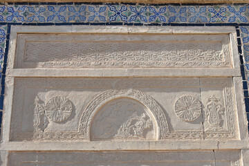 Wall Mural - Mosque Exterior Relief Carvings and Blue Tile Close-up, Takrouna, Tunisia