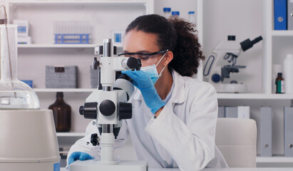 Wall Mural - science, medical and microscope with woman in laboratory for expert research, covid and planning. id