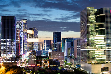 Canvas Print - Office buildings in the city at dusk