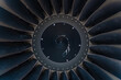 © Chris Fowler/Wirestock Creators - Close-up of the jet engine round and powerful turbine blades