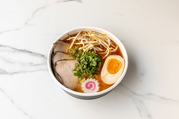 Sticker - Top view of a tasty beef noodle soup on the marble table