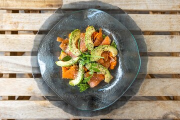 Poster - Closeup of a dish with salmon and avocado