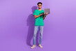 Full length photo of young student guy wear glasses hold laptop studying coding future successful programmer isolated on violet background