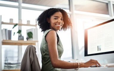 Black woman in business, smile in portrait and computer screen with charts and graph, project information and analysis. Data analyst, review of corporate report and happy female employee in office