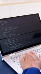 Coder Using Computer At Desk
