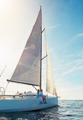 Canvas Print - Ocean, travel and boat in the outdoor with couple for adventure on luxury sea journey. Together, water and transport on yacht with rich lifestyle on a cruise in summer for a holiday with waves.