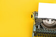 © Pixel-Shot - Vintage typewriter on yellow background