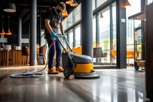 Professional Worker With An Industrial Vacuum Cleaner. Office And Industrial Cleaning Services