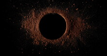 Cocoa Powder Pile In Shape Circle Isolated On Black, Top View