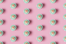 Seamless Repeating Pattern Of Cupcakes With Swirled Cream On A Cap, Green And Pink Colors On A Dark Pink Background Neutral Background