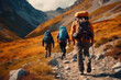 © gankevstock - Hikers walk along a trail in the mountains against the backdrop of mountains. View of the back, Generative AI