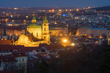 Illuminated St. Nicholas Church at night, Mala Stranar, UNESCO World Heritage Site, Prague, Bohemia, Czech Republic (Czechia), Europe