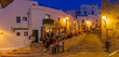 © robertharding - View of restaurants and bars in Dalt Vila at dusk, UNESCO World Heritage Site, Ibiza Town, Eivissa, Balearic Islands, Spain, Mediterranean, Europe