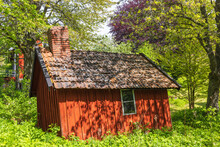 Old Leaning Red Wooden Shed