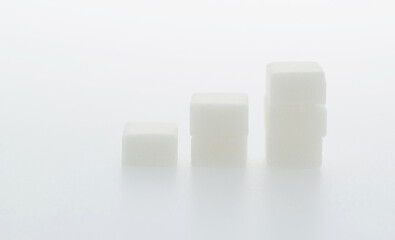 Wall Mural - Sugar cubes chart on white background