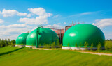 Fototapeta Tęcza - Green hemispheric tanks of biogas plant. Bioenergy factory in nature surrounding on sunny day. Generative AI.