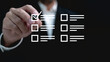 © Kanlaya - Questionnaire online with checkboxes, Businessman Take an assessment, Evaluation, Online survey online exam Choosing the right answer in the exam, Test questions. Filling out an online survey form.