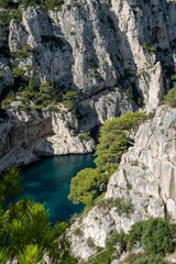 Wall Mural - Aerial view of pond surrounded by cliffs