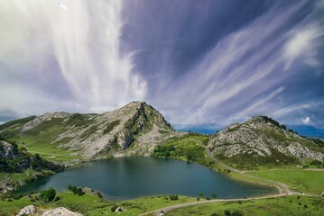 Poster - Beautiful landscape of a lake in rocky mountains on a cloudy day