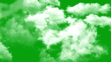 Abstract Of White Clouds Moving On Green Chroma Background