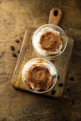 Wall Mural - Traditional homemade tiramisu served in glasses