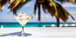 Ice cream cocktail in a tequila glass against the background of a blurred beach and sea with palm trees. Generative AI.